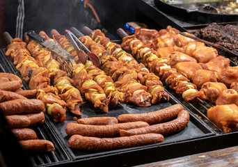 Large assortment of grilled sausages and kebabs at  Cracow christmas market