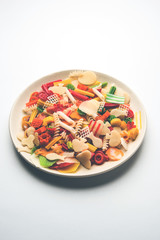 Snack pellets are non-expanded products made with raw materials like cereals, potatoes or vegetable powders, later processed using frying, hot air baking. multicoloured / shaped ready-to-eat snacks