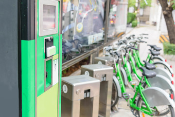 green bicycle for rent in city / bike for rent