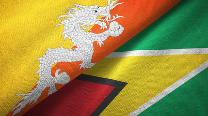 Bhutan and Guyana two flags textile cloth, fabric texture