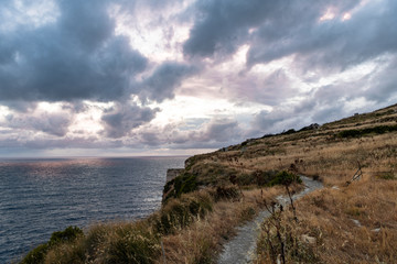 A narrow passage way near the edge fo the cliffs