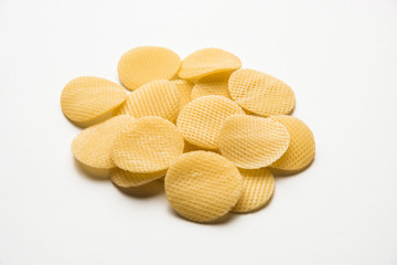 Snack pellets are non-expanded products made with raw materials like cereals, potatoes or vegetable powders, later processed using frying, hot air baking. multicoloured / shaped ready-to-eat snacks