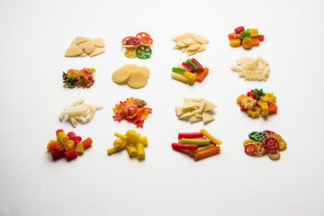 Snack pellets are non-expanded products made with raw materials like cereals, potatoes or vegetable powders, later processed using frying, hot air baking. multicoloured / shaped ready-to-eat snacks