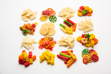 Snack pellets are non-expanded products made with raw materials like cereals, potatoes or vegetable powders, later processed using frying, hot air baking. multicoloured / shaped ready-to-eat snacks