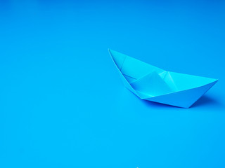 Business origami blue boat paper