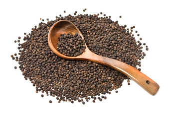 black peppercorns on white background