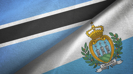 Botswana and San Marino two flags textile cloth, fabric texture