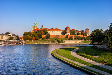 Fototapeta na wymiar Wawel Royal Castle at Vistula River in Krakow