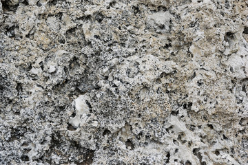 old rough, weathered, textured rock surface