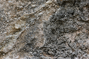 old rough, weathered, textured rock surface