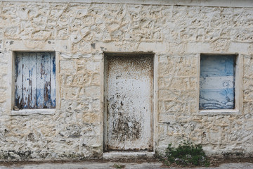 door of old abandoned village house