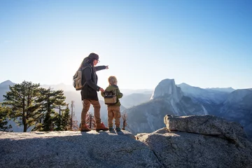 Gordijnen Mother with  son visit Yosemite national park in California © Maygutyak