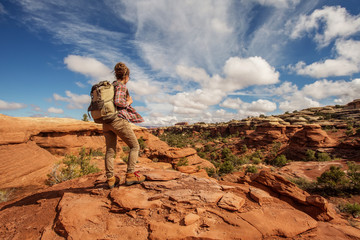Hiker in Canyonlands National park, needles in the sky, in Utah, USA - 268619357