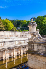 A beautiful fountain in the Jardin de la fontaine in Nimes, France