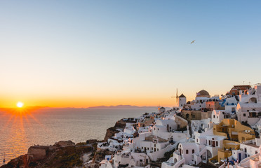 Panoramic skyline with windmills of Oia, Santorini, Greece