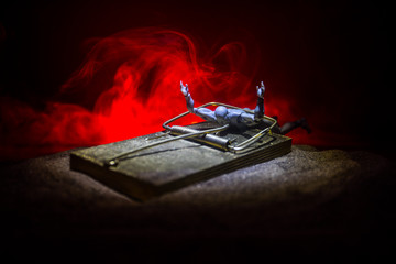 Creative concept. Artwork decoration of mousetrap on dark toned foggy background. Mousetrap...
