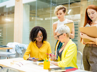 attractive women preparing a report. close up photo