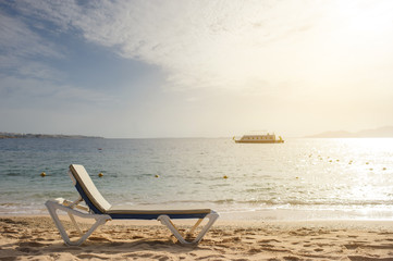 lateral view of a lounger on the beach of Red Sea coast