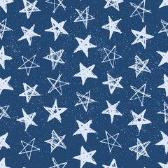 Hand drawn stars seamless pattern. Grunge vector background with doodle stars.