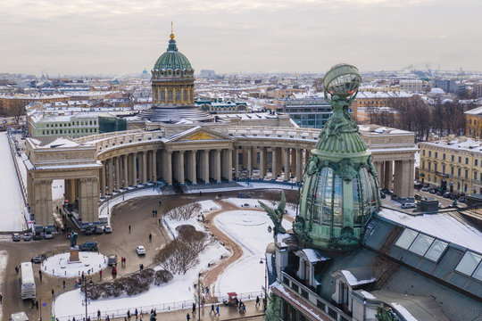 Aerial view of Kazan Cathedral in clear winter day, a copper dome, gold cross, colomns, Nevsky prospect, Zinger's Building, Griboyedov Canal, staff apartments vk.com, vkontakte