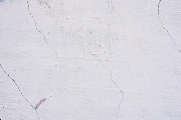 Texture, wall, concrete, it can be used as a background. Wall fragment with scratches and cracks