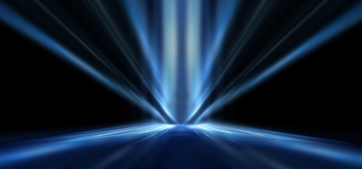 Dark empty abstract scene, rays of searchlights, neon blue light, highlights and lights. Night view of the scene, a tunnel with illumination. Dark background with spotlights.