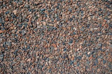 Small stones on the background. Texture. Chippings