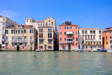 Venice houses facades and the grand canal in a sunny day in Italy