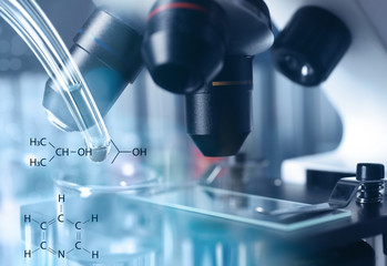 Modern microscope with different lenses, closeup. Chemical research