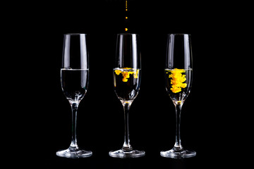 Color splashes in champagne glasses