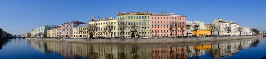 Fototapeta na wymiar City river houses panorama in Saint Petersburg, Russia. Fontanka river in Saint Petersburg, Russia.