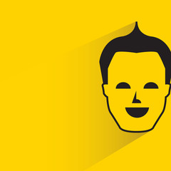 human face with shadow in yellow background