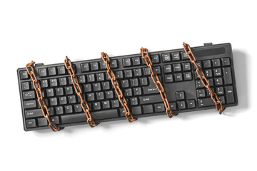 Black keyboard with a coiled chain. Concept for the topic of censorship or freedom of the press. © Павел Абрамов