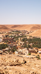 Beautiful panorama skyline view of Bou Saada surrounded by desert from above in Algeria