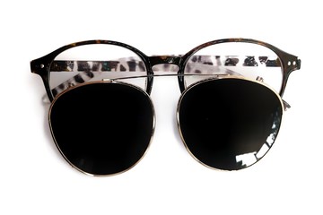 Spectacles  clear glasses Striped glasses with sun glass clip on isolate on white background