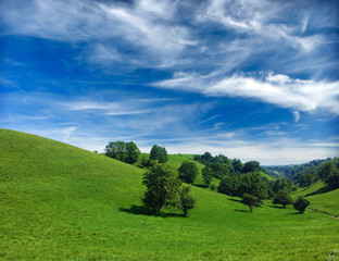 Fototapeta na wymiar green hills and beautiful sky