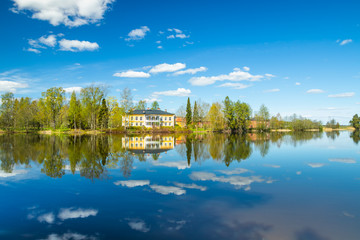 Kouvola, Finland - May 16, 2019: Beautiful wooden Rabbelugn Manor - Takamaan Kartano. Wrede family house was built in 1820 on the river Kymijoki bank.