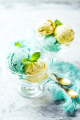 Ice cream with mint in ceramic bowl
