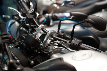 several modern stylish motorcycles, closeup