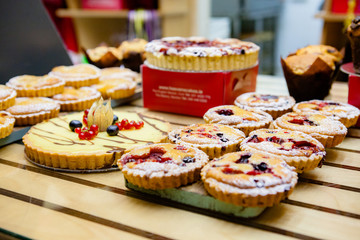 Various Different Types Of Sweet Cakes In Pastry Shop