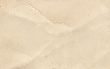 Texture old paper with traces of scuffs and stains.