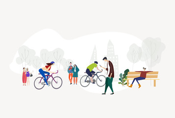 People in the park, relaxing, walking, reading, cycling. City life
