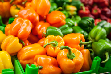 Fresh Yellow, orange, greeen and red peppers at the market