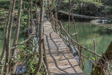 View of ecological bridge, made with recycled materials, in pedestrian route in the Dão river