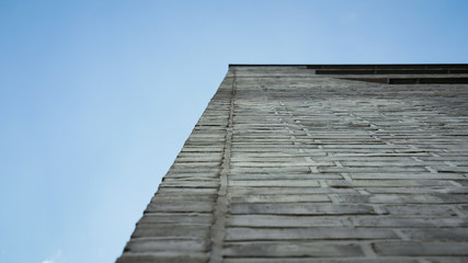 Fototapeta na wymiar ladder to the sky - Building made out of bricks