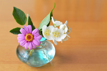 Mothers Day card with flowers in vase, copy space