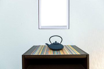 Antique teapots placed in the living room