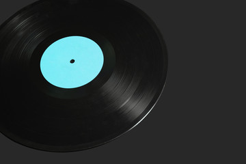 Obraz premium Black vinyl record lp album disc with blue blank label