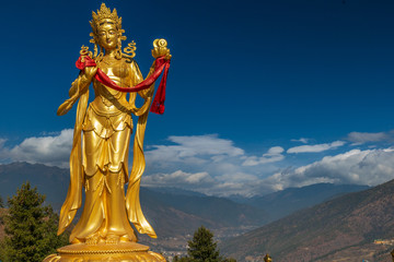 Gilded Bodhisattva statue in Thimphu - obrazy, fototapety, plakaty