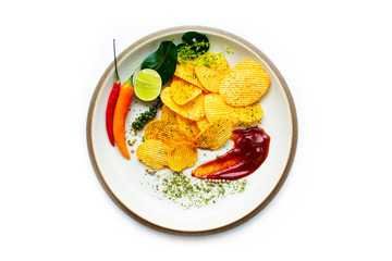Crispy potatoes and spices on the plate ready to serve White background